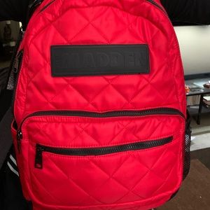 Red quilted Steve Madden backpack